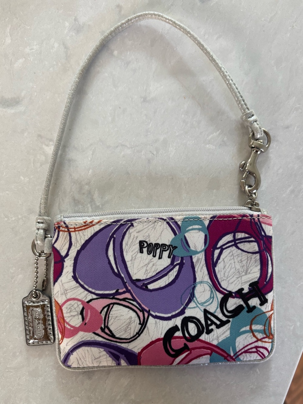Coach Poppy Graffiti Wristlet